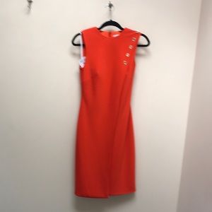 Ieena Macduggal bright orange interview dress